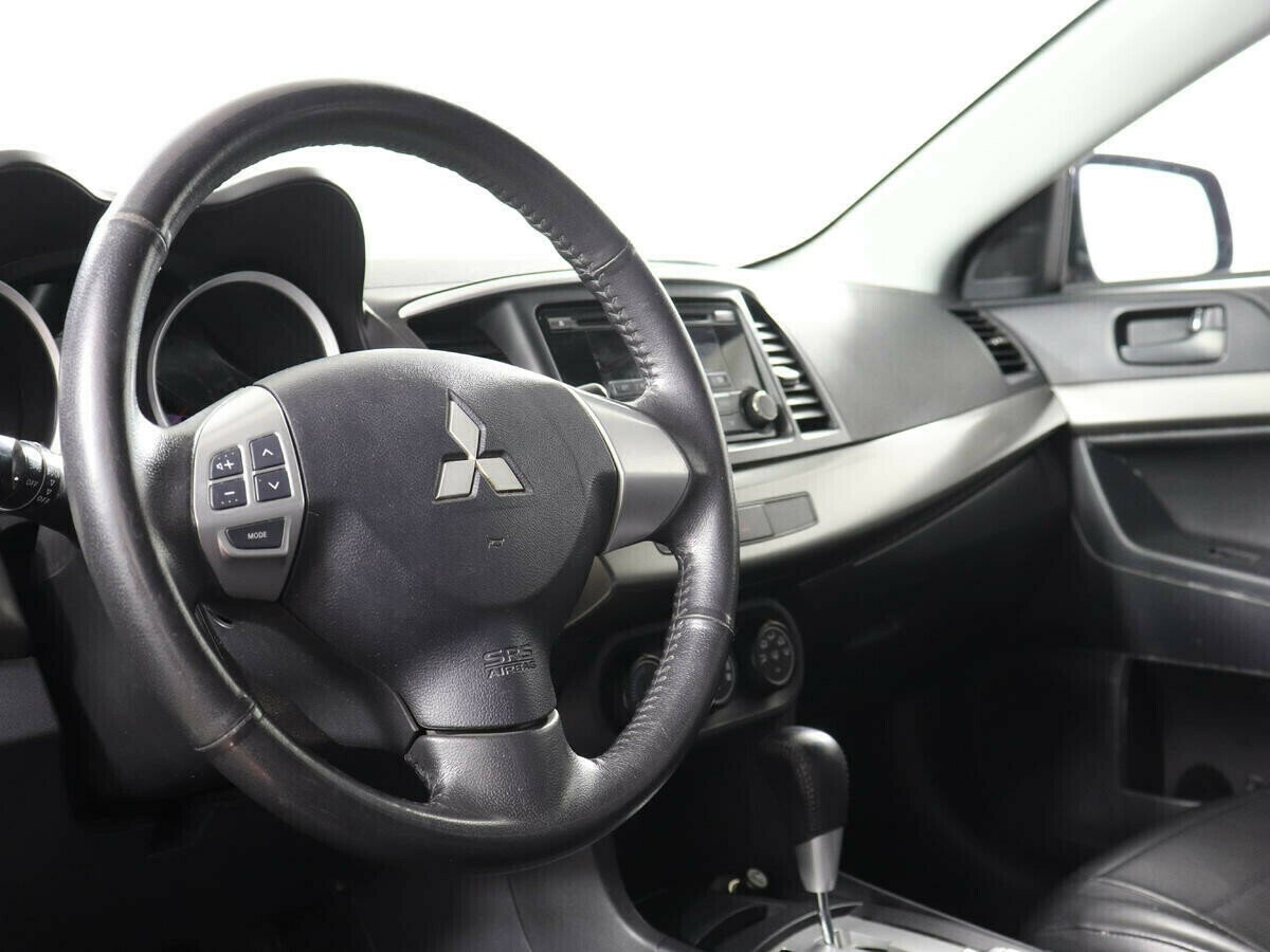 Mitsubishi Lancer, 1.6 л, АТ, 2014 фото 2
