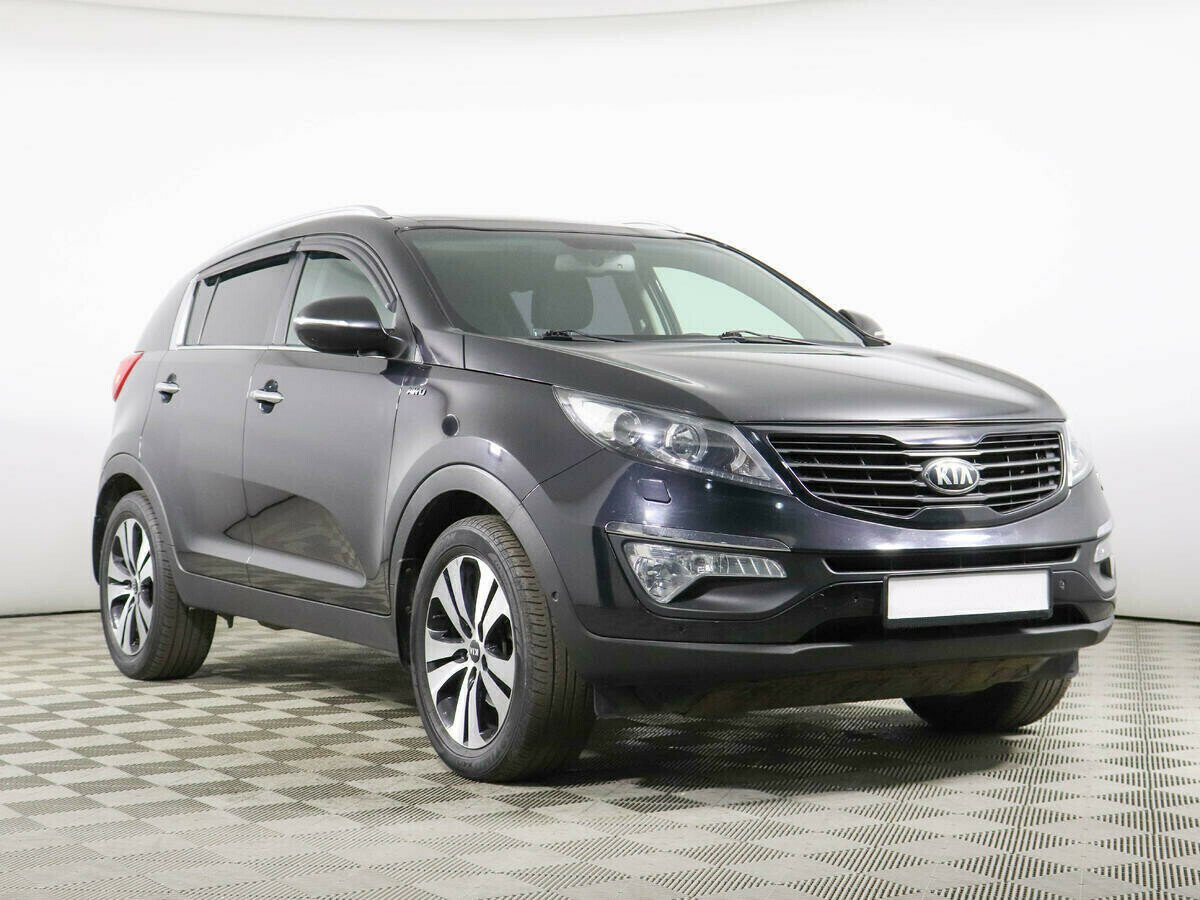 Kia Sportage, 2.0 л, АТ, 2014 фото 1