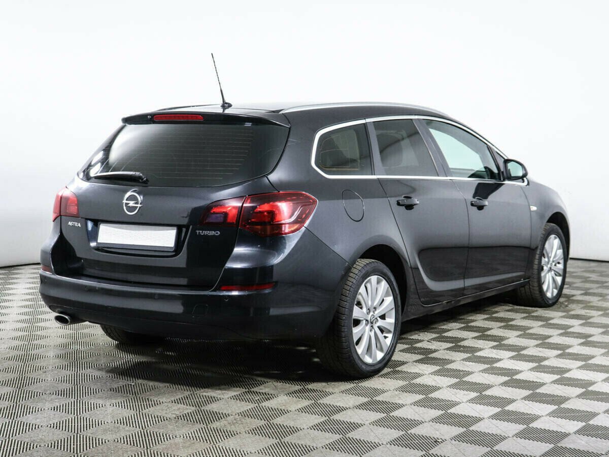 Opel Astra, 1.4 л, АТ, 2012 фото 4