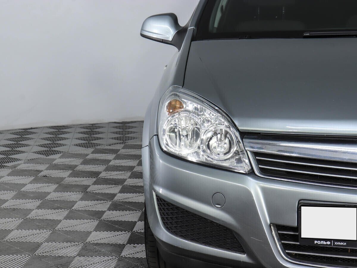 Opel Astra, 1.8 л, МТ, 2012 фото 1