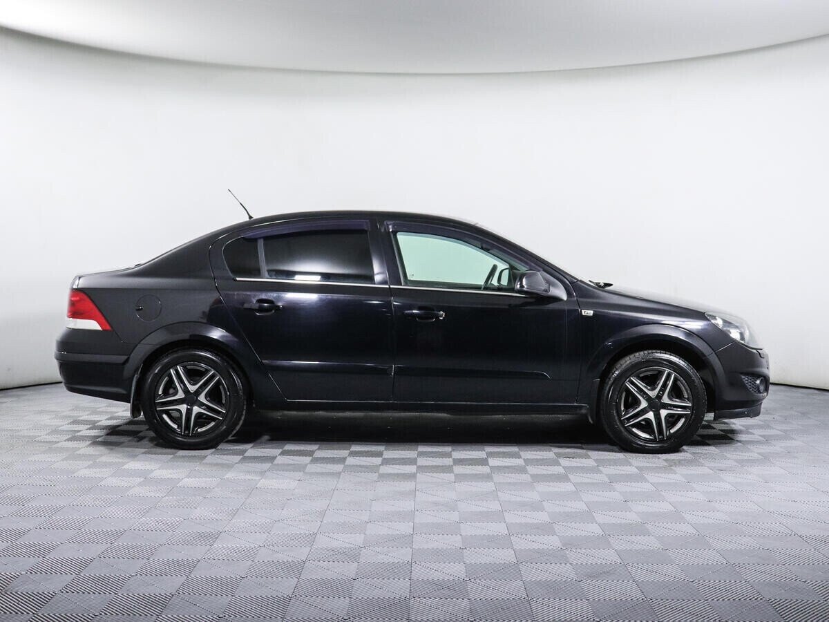 Opel Astra, 1.8 л, АТ, 2011 фото 6
