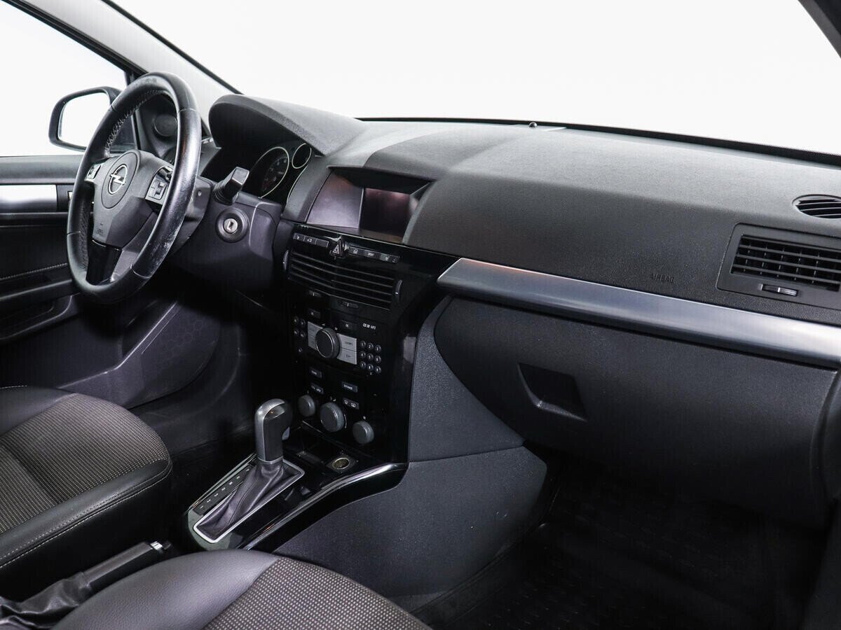 Opel Astra, 1.8 л, АТ, 2011 фото 11