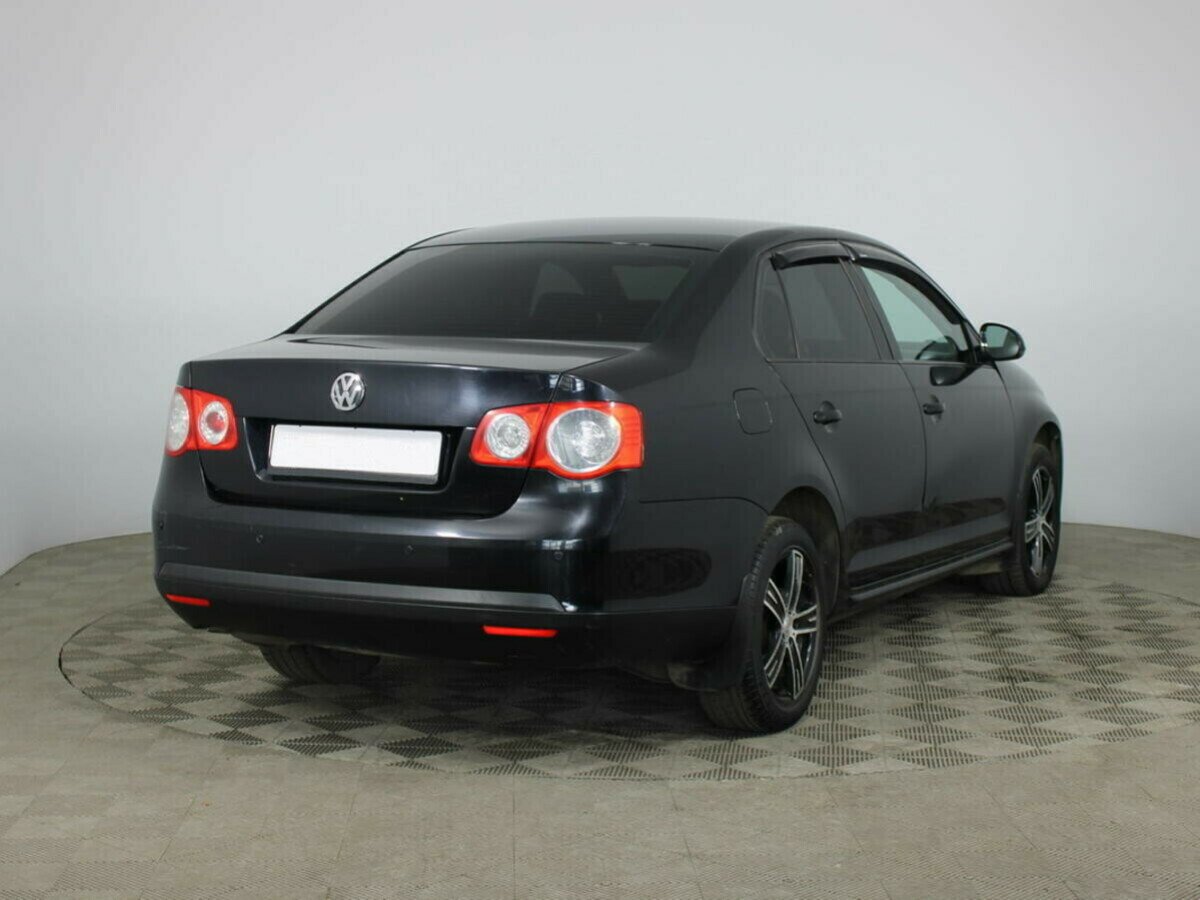 Volkswagen Jetta 1.6 РКПП, 2009, 179 000 км фото 4